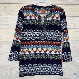 Tory Burch tunic with beading detailing around neckline.
